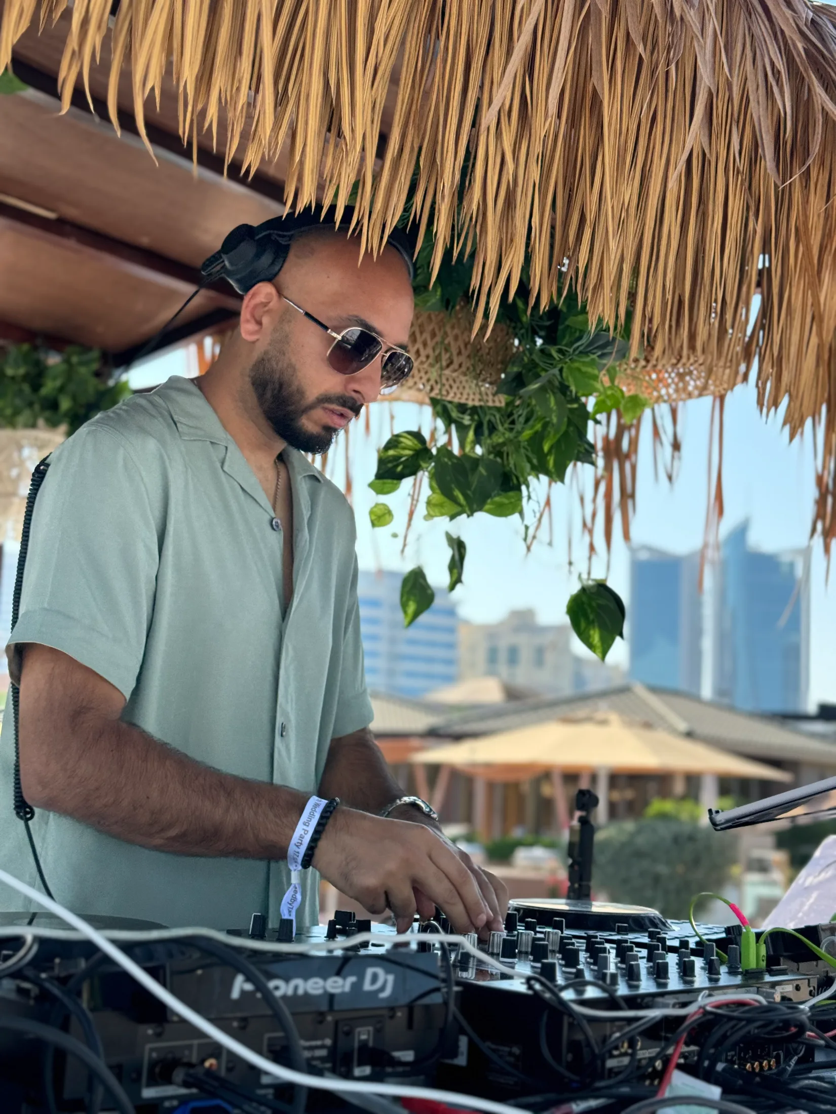 DJ H of Kudos Music DJing at a destination event
