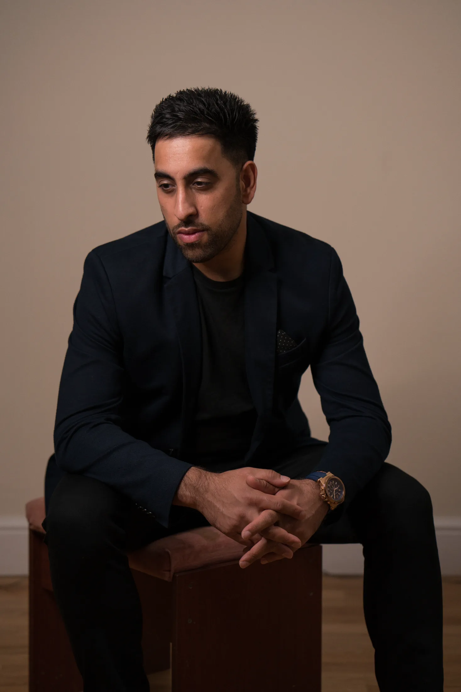 DJ Aman K in black tie hosting an event, Kudos Music DJ and MC