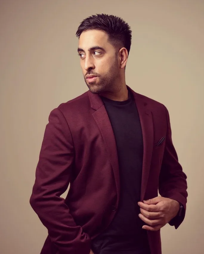 DJ Aman K in a maroon blazer, Kudos Music DJ
