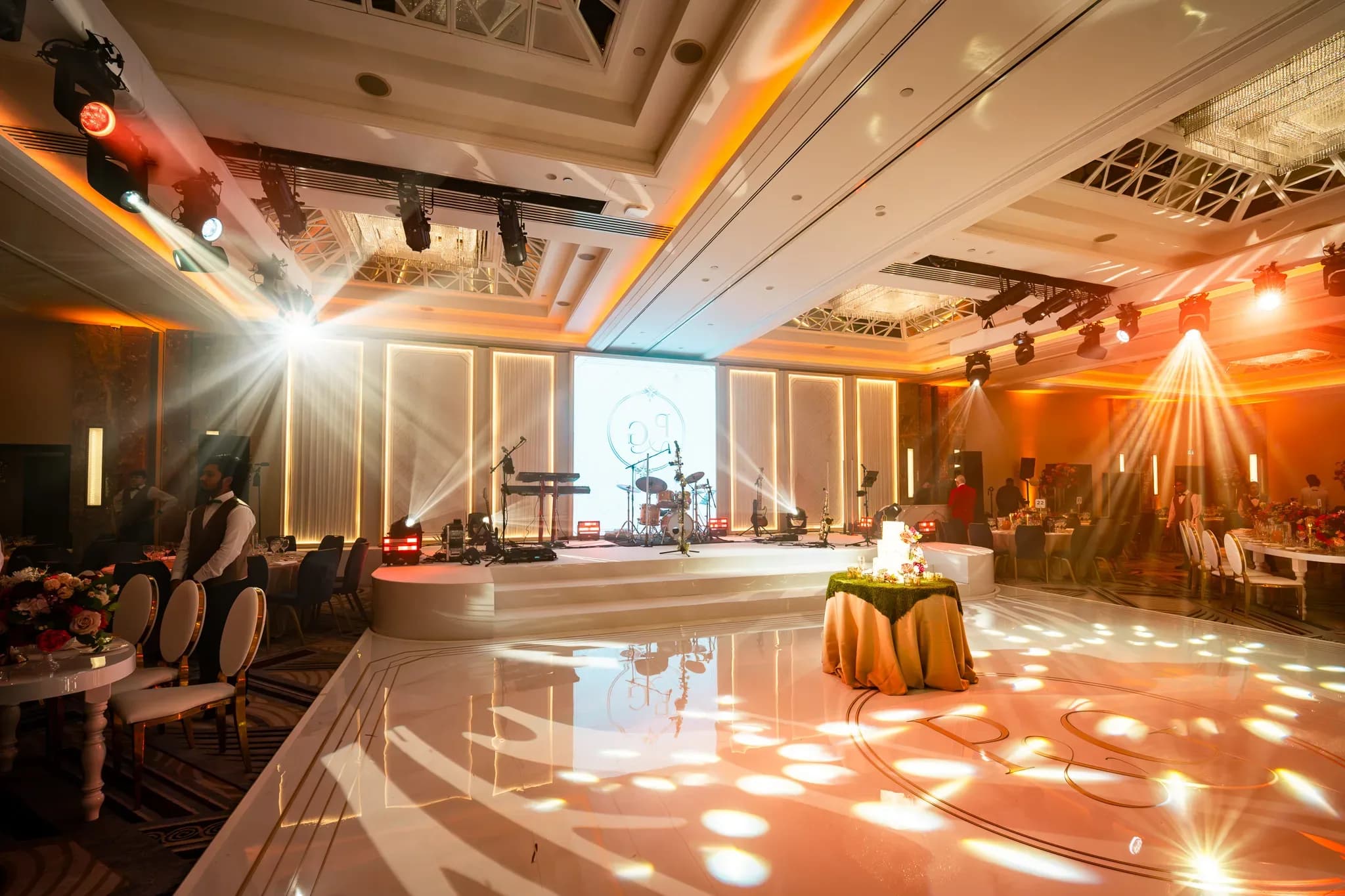 Before the room fills | Royal Lancaster London | Kudos Music The white dancefloor and warmly lit stage before guests join the celebration at Royal Lancaster London.