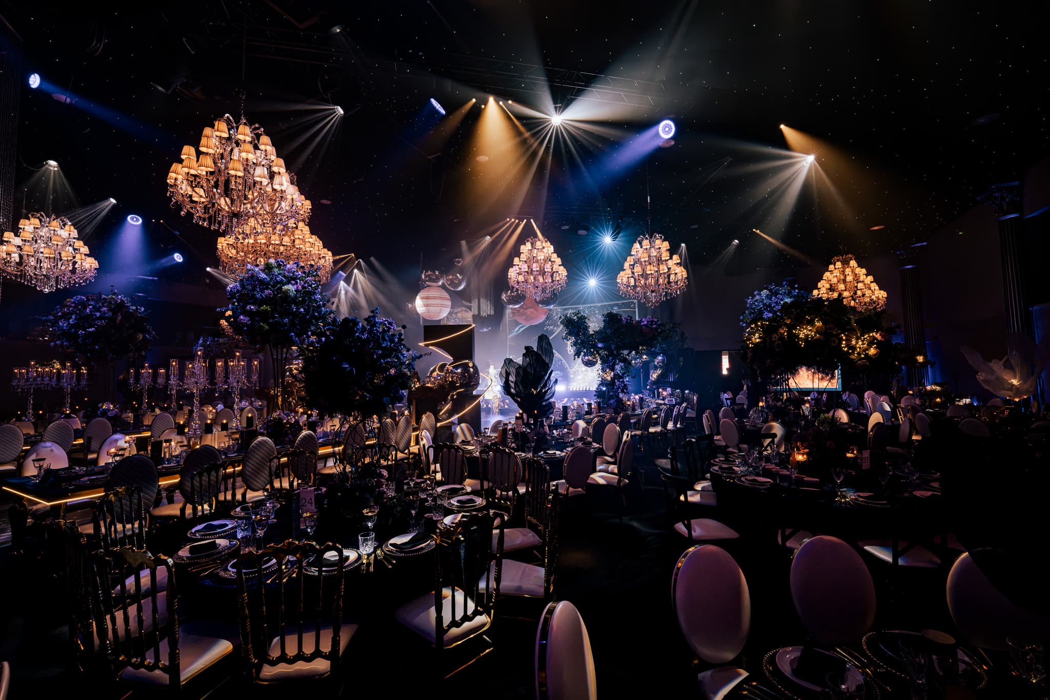 The tables turned towards the DJ stage under the chandeliers at Charan and Puneet's wedding, IXL Events Centre, Dallas Burston, Kudos Music