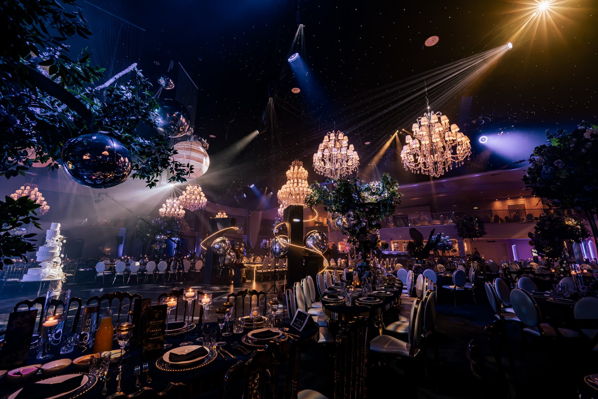The room filling up under the chandeliers before the dhol drumline at Charan and Puneet's wedding, IXL Events Centre, Dallas Burston, Kudos Music