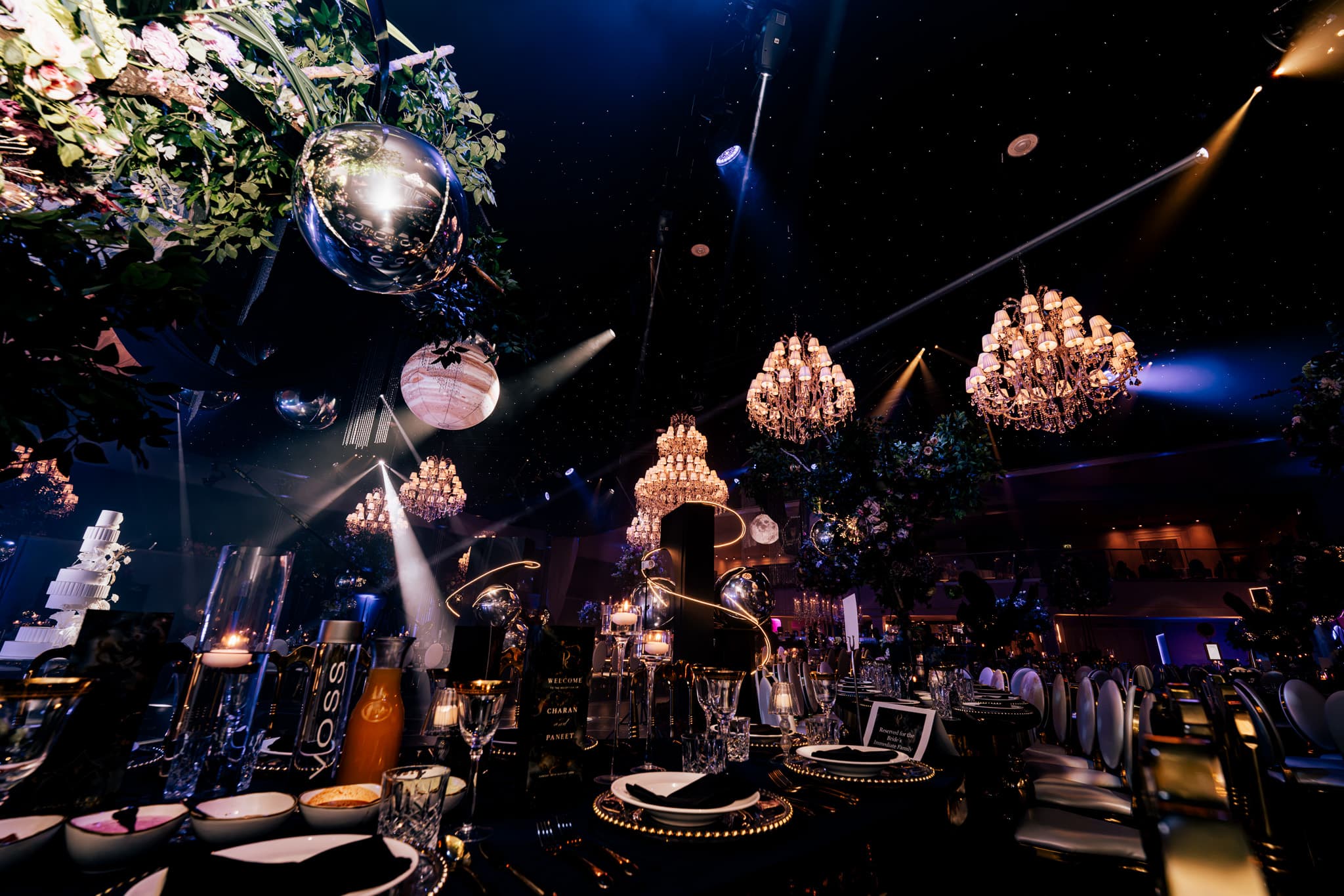 Gold on the tables, uplighting on the walls, at Charan and Puneet's Out Of This World wedding, Dallas Burston Polo Club, Kudos Music